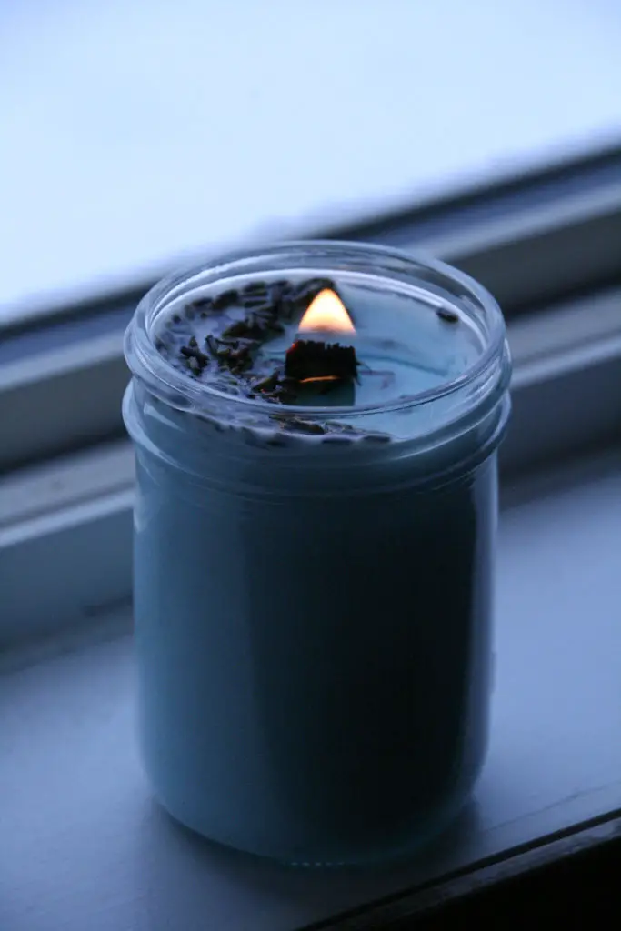 a home made clean burning soy wax candle in a mason jar
