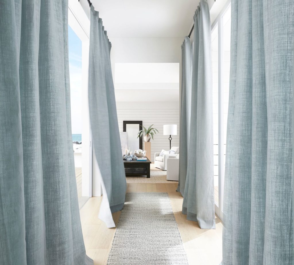 blue curtains let lots of light in during the winter months