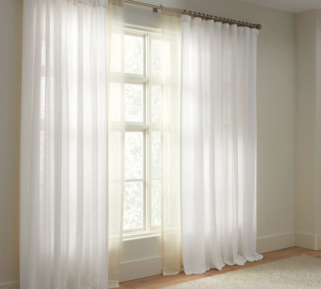 sheer curtains are great for letting light in during the winter months