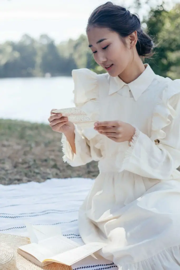 a woman reading a beautiful love letter