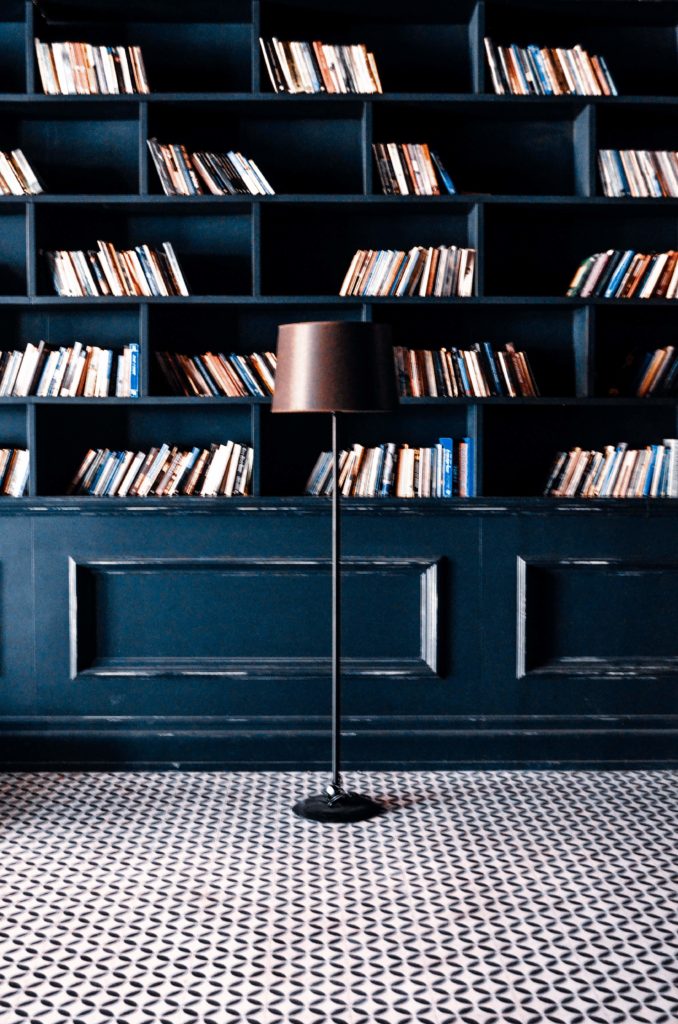 a beautiful dark style modern personal library built on a budget at home