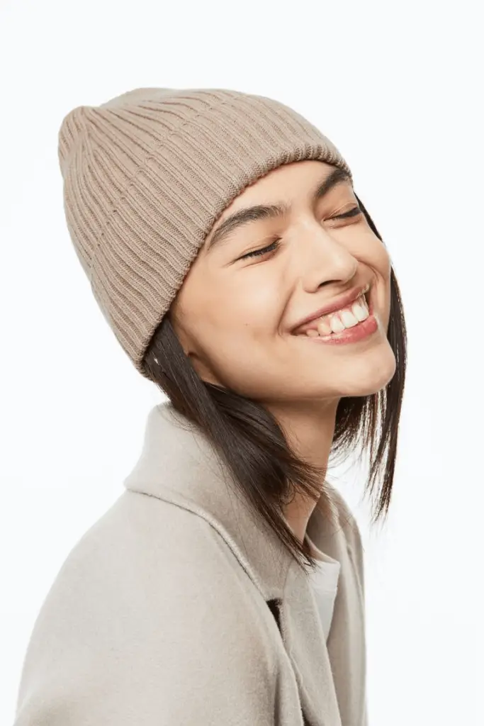 A warm knit beanie from H&M is perfect for keeping warm in the fall while outdoors.