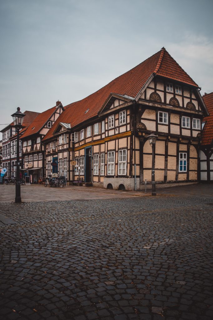 In the heart of Nienburg/Weser, Germany where you can see cobblestone streets an old buildings.