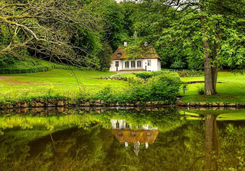 A beautiful quaint church beside a lake in Denmark.